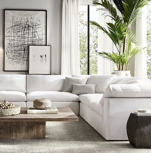 Living Room Close-up keyholes with curtains and a handle on the gray many times painted cracked double-barreled wooden vintage door of the last century with a post slit.